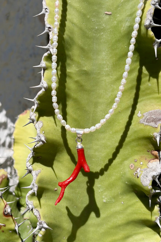 Freshwater pearl necklace with coral pendant
